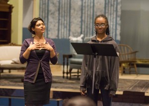 Opera singer Alexa Lokensgard '99 helps a student thespian with her delivery.