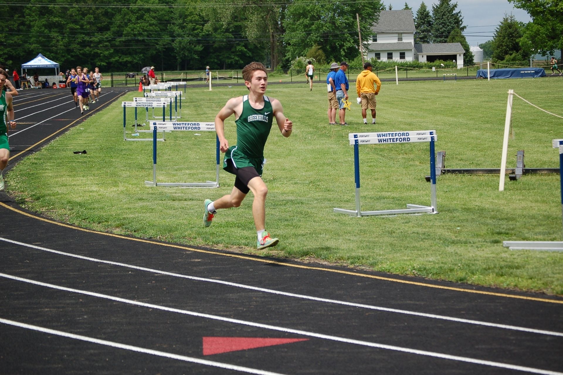 TRACK REGIONALS SUCCESSFUL DESPITE DELAY Greenhills School
