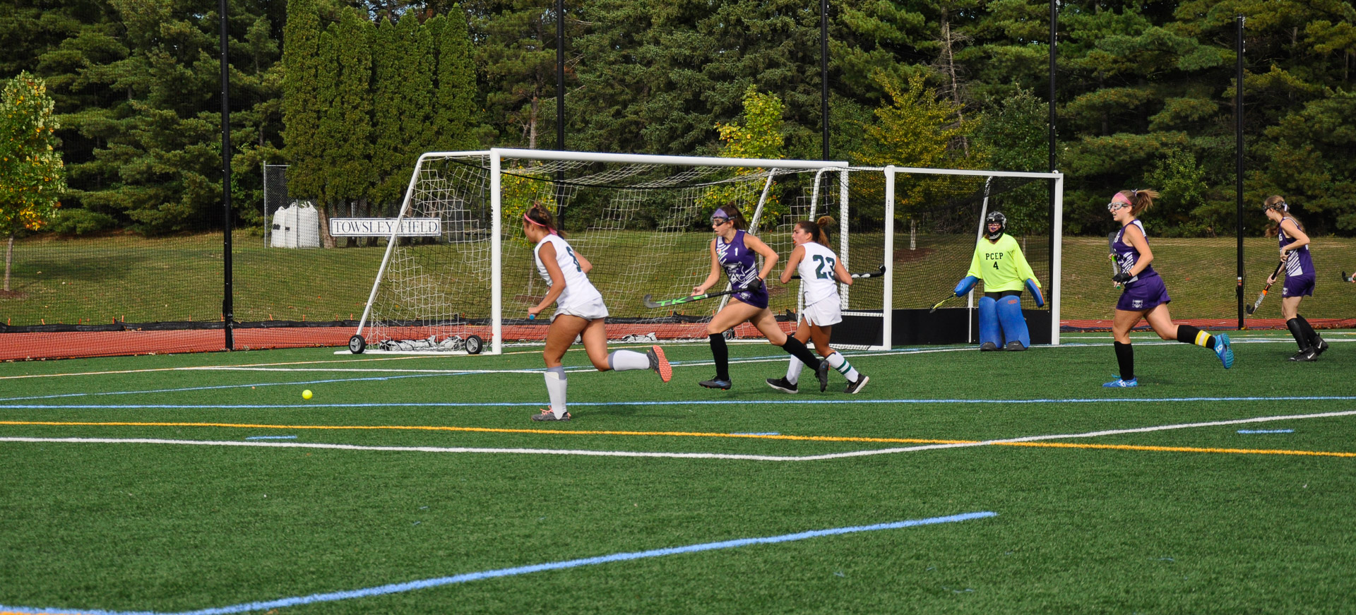 Amelia Danan '23 beats a defender to the ball in the corner. 